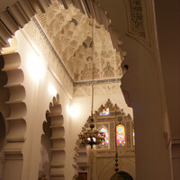 Qarawiyyin Mosque, muqarnas vault and cursive inscription before the mihrab