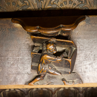 Toledo Cathedral, misericord with man and chest