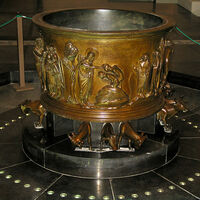 Liège font, John the Baptist baptizing two young men