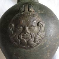 Bangkok National Museum, early Byzantine lamp from Pong Tuk, Thailand, detail Silenus lid