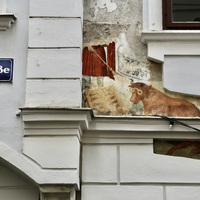 Wolf and cow playing backgammon, Vienna