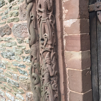 Kilpeck parish church, detail of south portal, warriors on left jamb