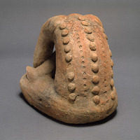 Metropolitan Museum, seated figure, back