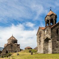 Haghpat Monastery, bell tower (13th c.) with east facade of Surb Nshan church in background